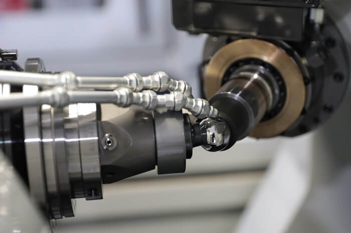 close up of two pieces of machinery being built