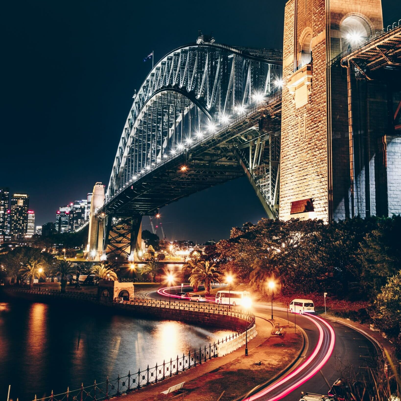 city of sydney harbour bridge at night time